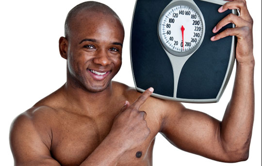How much more does muscle weigh than fat?